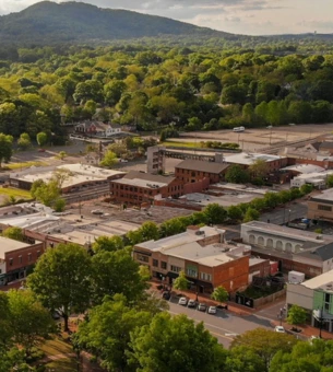 historic marietta square aerial view with mountains in the background