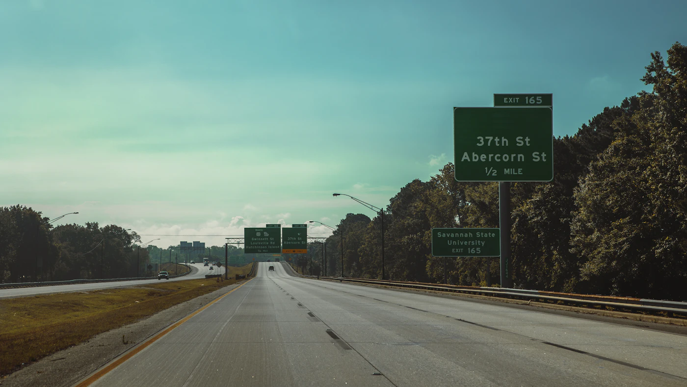 Georgia highway sign illustrating an Atlanta to Columbus trip